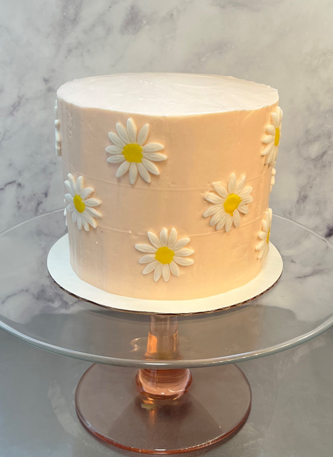 A custom 2-tier daisy cake for sweet baby girl Leah's 2nd birthday party  🥳🎂 Thank you Mommy @cherylisaunicorn for sharing with us the… | Instagram